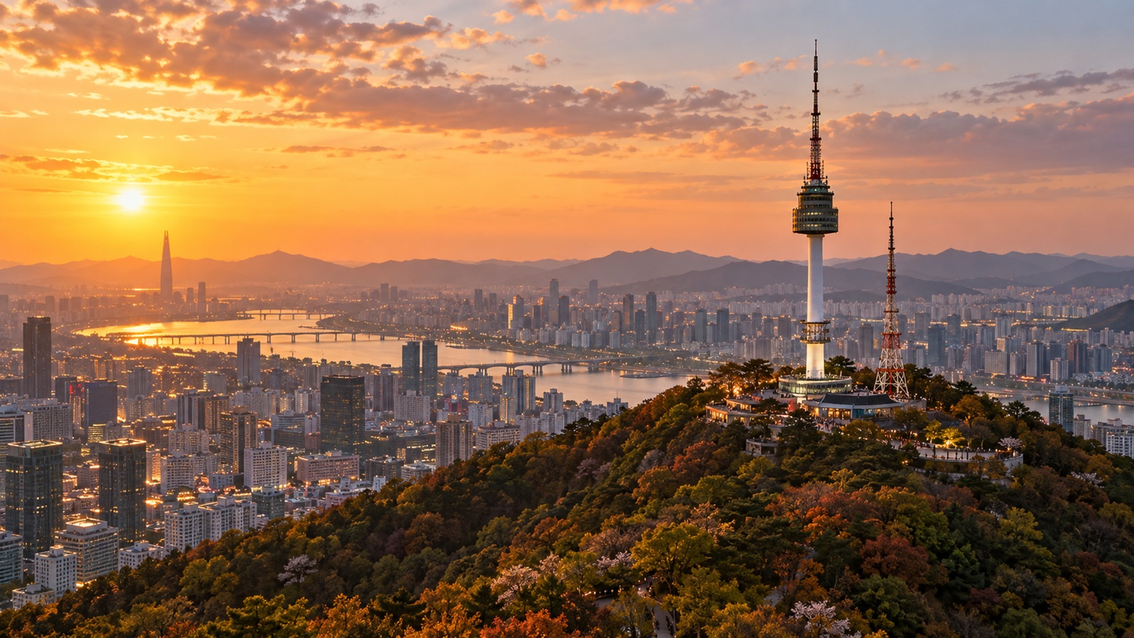 N Seoul Tower on Namsan Mountain overlooking the Seoul skyline at golden hour.